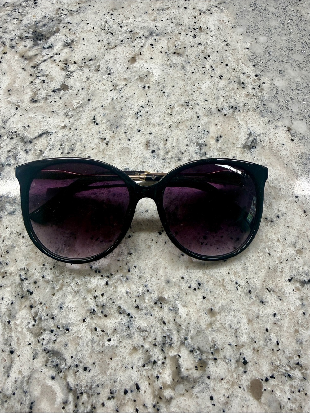 Gucci womens sunglasses. Black Frames with Purple Gradient Lenses
